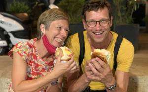 Couple enjoying brioche with ice cream